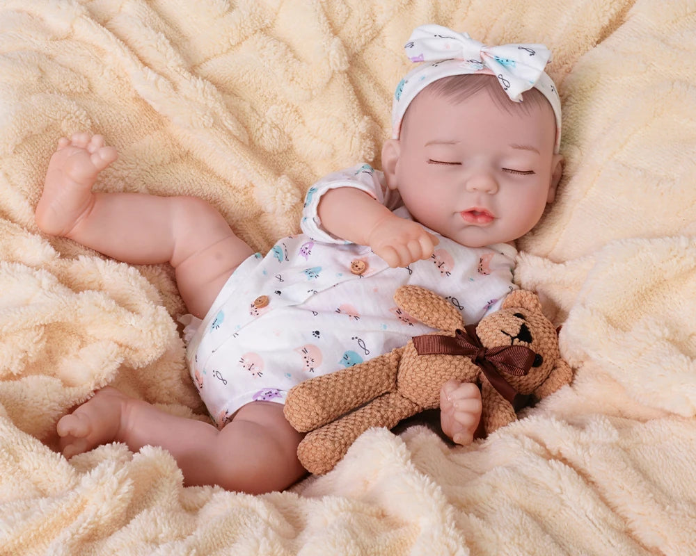 baby dolls | realistic baby dolls | sleeping reborn dolls | sleeping doll | squishy dolls | peaceful expression | soft and cuddly | delicate hand-painted features | gentle embrace | bedtime companion